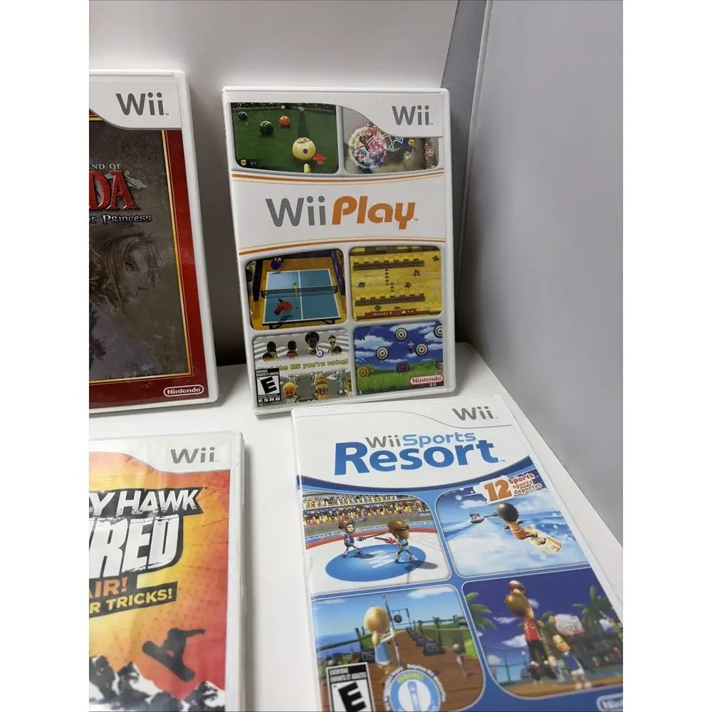 Nintendo Wii 25th Anniversary Red Console Bundle, 3 Remotes, 4 Games ,2 Nunchuk